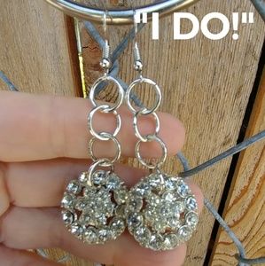 Handcrafted earrings using reclaimed jewelry